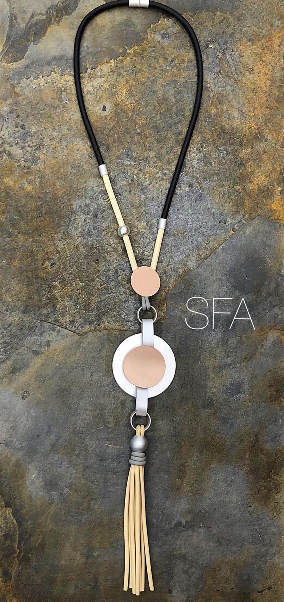 Fabulous lagenlook long rubber tassel necklace, in 2 different colours with 2 tone arched layered discs.