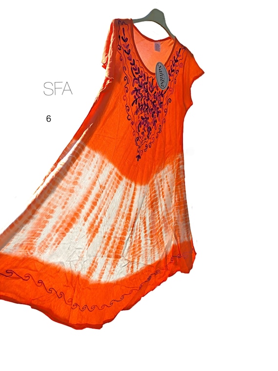 Fabulous floaty hippy chic sun dress or tunic, with short sleeves, embroidered front panel. In 6 different colours regular and plus size.