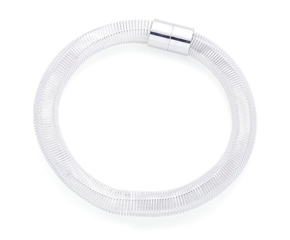 Stunning geo necklace, choker, polished stainless steel. With spring, coil effect, with a magnetic fastener. Fits all sizes.