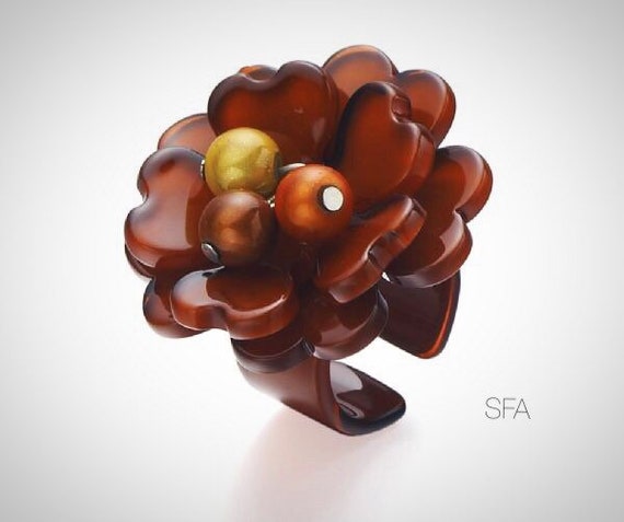 The Sofia acrylic statement ring. With central loose berry beads, fabulous statement piece