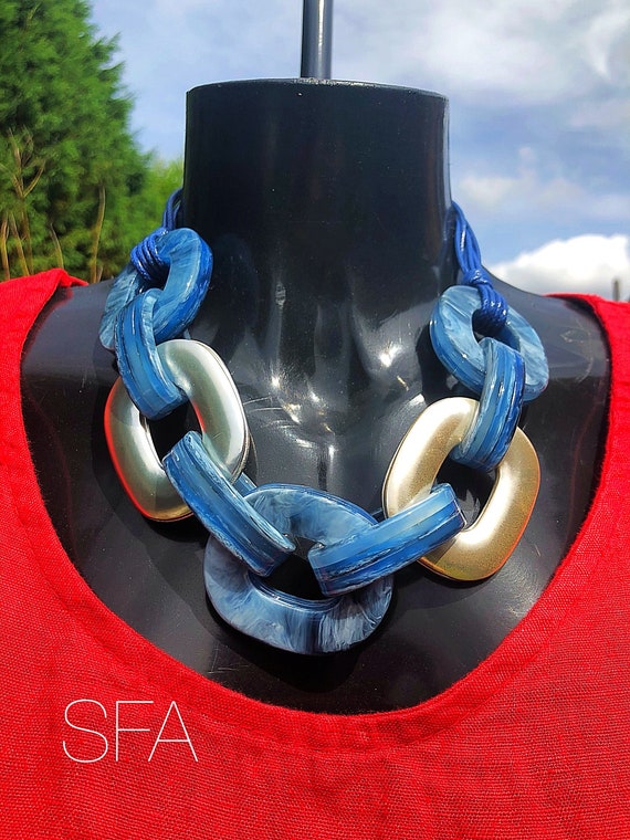 Fabulous lagenlook overized blue acrylic and alloy linked short necklace on a blue coated cord string multi thread chain.