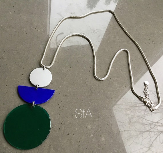 Lagenlook long necklace with a silver snake chain and geo acrylic shapes, with a frosted matt silver circle.