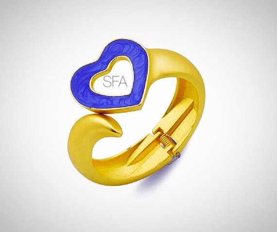 The Cleo gold frosted bangle. Heart shaped blue enamel cuff, Spring fastener