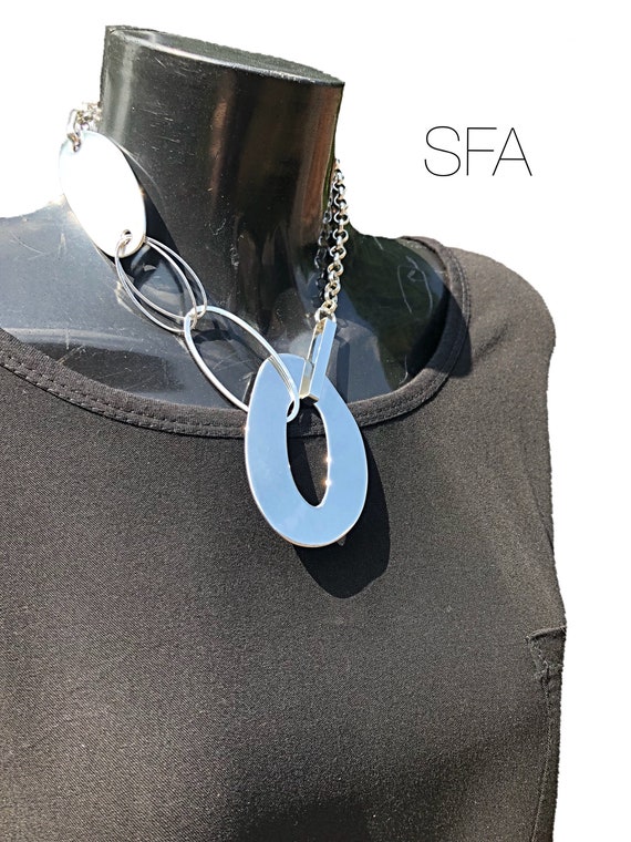 Geo large oval necklace, with oval tag, on a silver belcher chain with lobster clasp and extension chain
