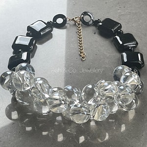 Fabulous chunky acrylic necklace in deep clear and black.
