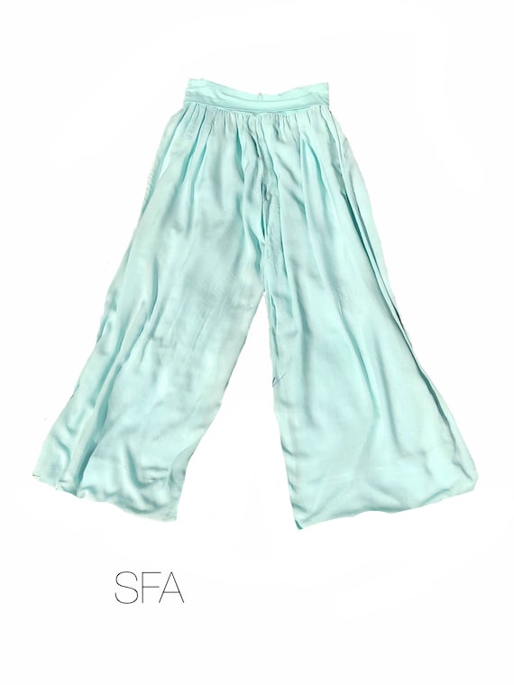 Fabulous palazzo harem pants with wide stretch waist band, in 5 colours, white, cream, beige, blue, black and mint green.