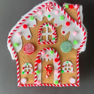 Lebkuchenhaus Kranzschmuck: weihnachtliche Landhausdekoration