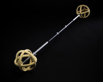 May include: A silver exercise stick with two beige weighted balls on the ends. The balls are made of woven rope.