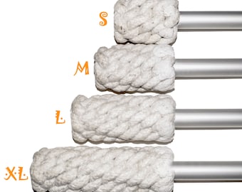 May include: Four white cotton rope fire starters of different sizes, labeled S, M, L, and XL, attached to silver metal rods.