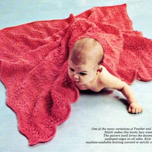 May include: A pink crocheted baby blanket with a scalloped edge. The blanket is made with a feather and fan stitch pattern. One of the many variations of Feather and Fan Stitch makes this lovely lacy coverlet. The pattern itself forms the decorative scalloped edges on all sides. Knit it of machine-washable knitting worsted or acrylic yarn.