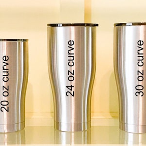 May include: Three stainless steel tumblers with black lids. The tumblers are labeled with the text "20 oz curve", "24 oz curve", and "30 oz curve".