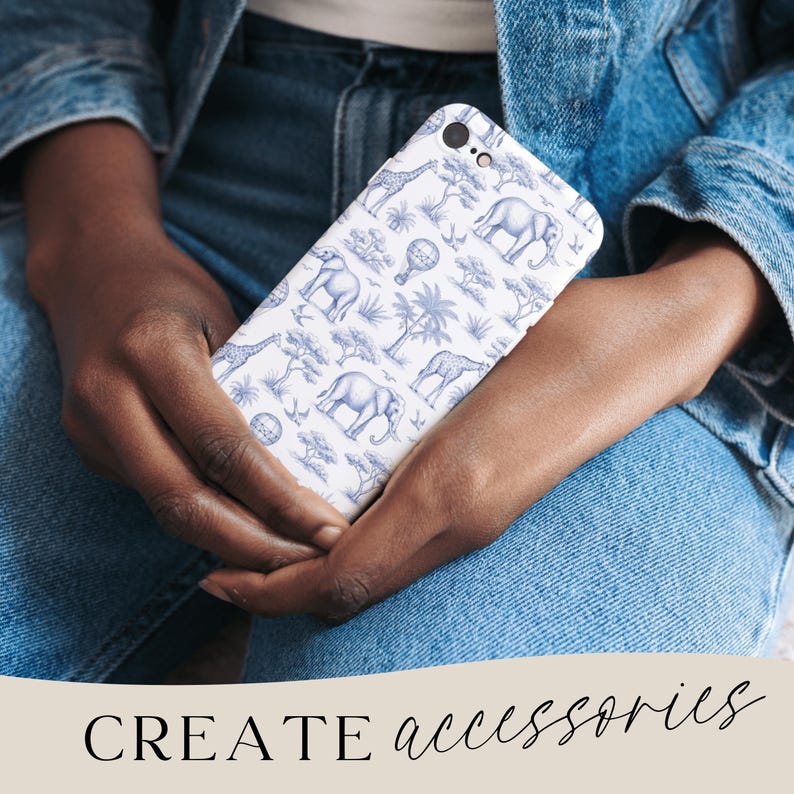 May include: White phone case with a blue safari animal pattern, including elephants, giraffes, and trees. The text "CREATE accessories" is at the bottom of the image.