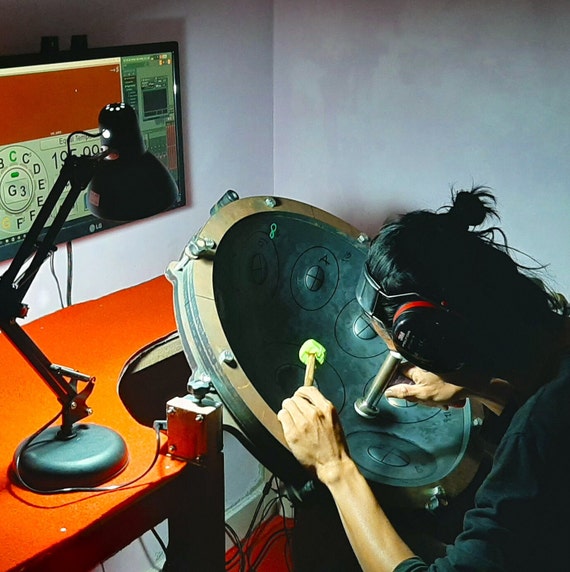 Mini instruments de batterie de casserole de main de tambour de handpan  pour des adultes, notes de percussion d'instrument de note de handpans en  métal de ré mineur -  France