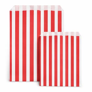 May include: Two rectangular paper bags of different heights featuring a vertical red and white striped pattern. The bags have an open top edge and a flat base, displaying a consistent colour scheme across both items in a side-by-side arrangement.