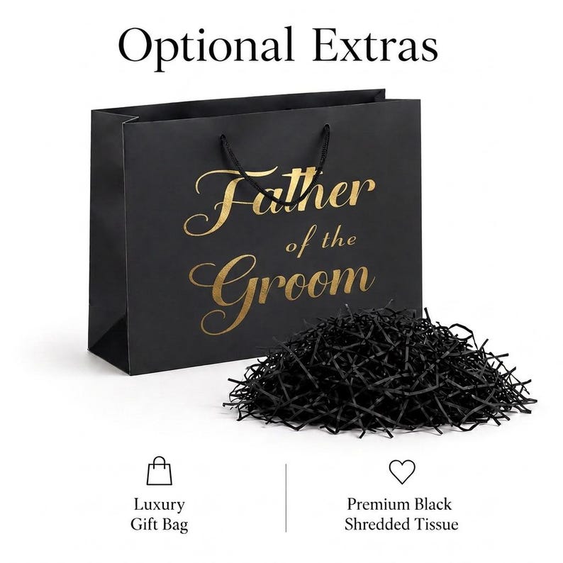 May include: A black gift bag with the gold text Father of the Groom printed on the front, featuring black cord handles and a pile of black shredded tissue paper. The text Optional Extras appears at the top, with icons and labels below.