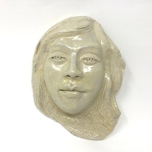 Woman&#39;s face sculpture for the wall, ceramic mask, amicable hopeful face, wall art,  pottery mask,  3D art, housewarming gift