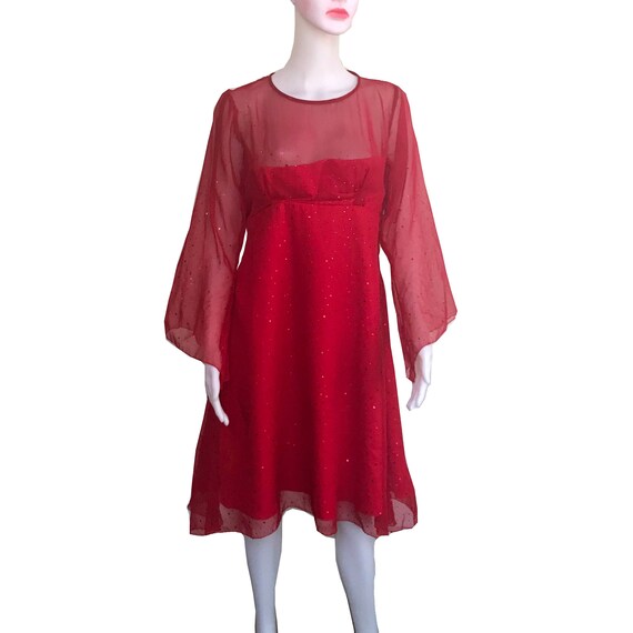 cocktail dress with sheer sleeves