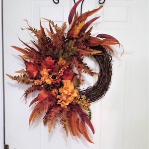 Bright Gold and Orange Floral Grapevine Wreath for Door, Wall Décor, Perfect for Fall, Is a Colorful Favorite.