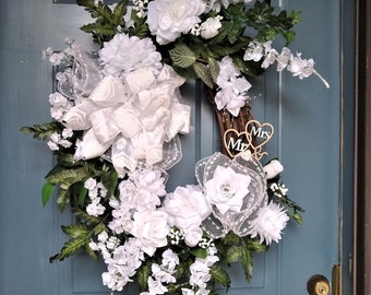 White Wedding Wreath is lovely as door or wall décor for event, church or home and pre-wedding festivities like bridal showers.