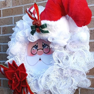 Santa Face Wreath with Fluffy White Hair, Beard and Large Elegant Santa Hat with Berries and Sparkles, Perfect for Front Door or Inside Wall