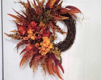 Bright Gold and Orange Floral Grapevine Wreath for Door, Wall Décor, Perfect for Fall, Is a Colorful Favorite.