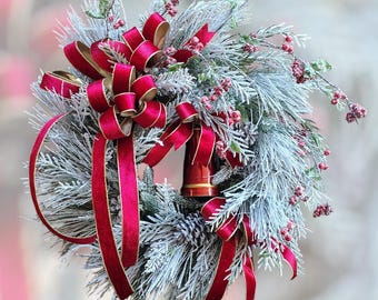 Winter or Holiday, Flocked Wreath with Red Bell, Evergreens, Red Berries and Velvet Double-sided Bow