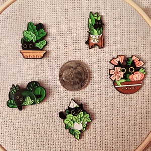 Cat Hiding in Plant Needle Minder