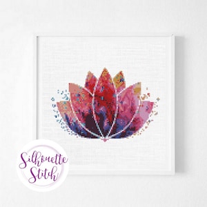 May include: A colorful watercolor-style lotus flower cross stitch pattern. The flower is pink, red, blue, and yellow. The pattern is on a white background.