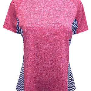 May include: A pink and blue short-sleeved shirt with a chevron pattern on the sides.