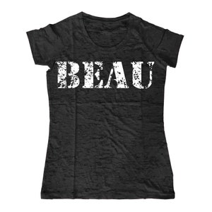 May include: Black t-shirt with a white distressed font that reads "BEAU".