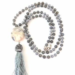 Long beaded natural gemstone tassel necklace with a beautiful gray lace agate pendant