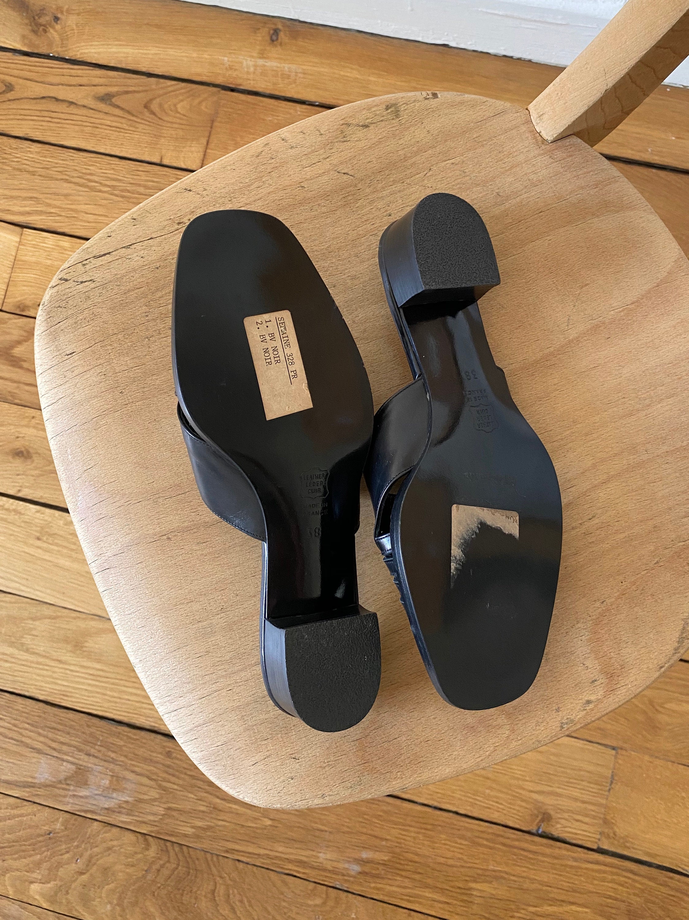 black woven mules