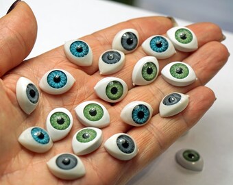 fake eyeballs on a thread