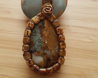 Brown merciline pendant with tila beads wire wraped