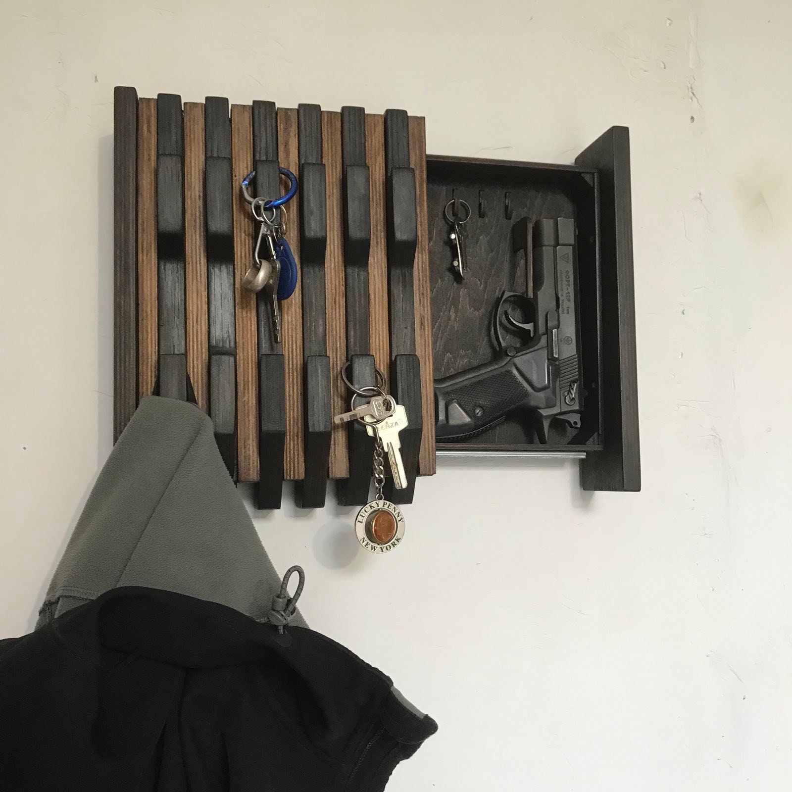 Gun concealment wall art deals