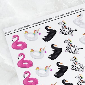 May include: Sheet of mini icon stickers featuring pink flamingo floats, unicorn floats, black swan floats, zebra floats, and white swan floats. The stickers are arranged on a white background. The text "LUCID LAIR - MINI ICON STICKERS" is printed at the top.
