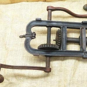 May include: A set of three ceramic mugs with a speckled, matte finish. The mugs are in shades of cream, light gray, and dark gray. Each mug has a simple, minimalist design, perfect for coffee or tea.