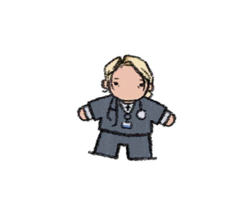 May include: A cartoon-style illustration of a figure with blonde hair wearing a dark gray scrub top and matching pants. The figure has a stethoscope draped around the neck and a small identification badge hanging from the center of the scrub top.