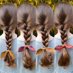 May include: Four images of a person with long brown hair braided into a single braid. Each image shows a different color crocheted hair tie. The hair ties are in shades of brown, orange, and pink.