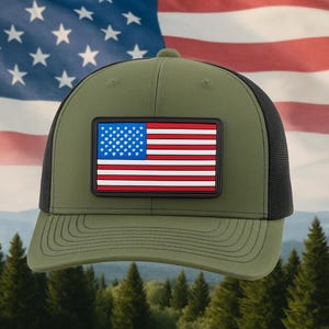 May include: An olive green baseball cap with a black mesh back and a rectangular patch featuring the American flag. The cap has a curved brim and a structured crown, perfect for outdoor activities.