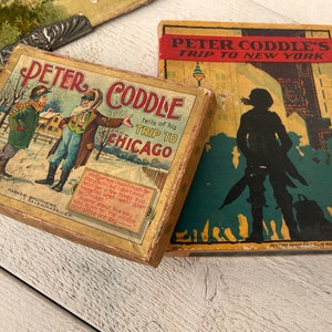 Cajas de juegos antiguos, cajas de cartón vacías de juegos antiguos, coleccionables publicitarios, diario basura, parcialmente dañadas