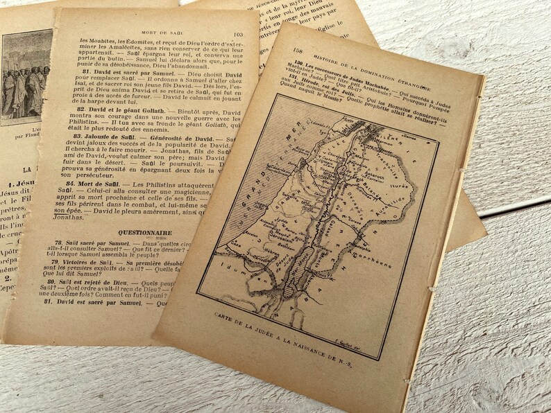 May include: A vintage, black and white map of the land of Judea, showing the location of Jerusalem and other cities. The map is printed on a page from an old book, with text in French.