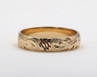 Sea turtle wedding ring from Hawaii, made of solid 14K gold, hand engraved design (barrel style)