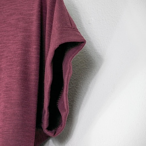 Womens semi fitted organic slub cotton tshirt with dropped rear hem. Available in cherry red.