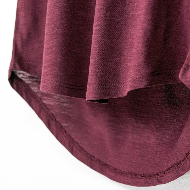Womens semi fitted organic slub cotton tshirt with dropped rear hem. Available in cherry red.