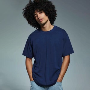 May include: A navy blue short-sleeved t-shirt with a crew neck.