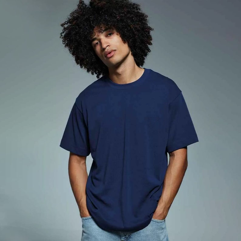 May include: A navy blue short-sleeved t-shirt with a crew neck.