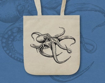 Puede incluir: Una bolsa de tela beige con una ilustración en blanco y negro de un pulpo en la parte delantera. El pulpo tiene ocho tentáculos y está dibujado en un estilo vintage.