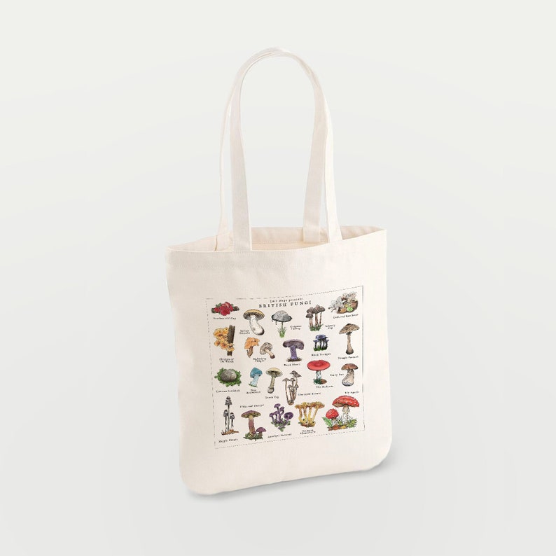 May include: A white canvas tote bag with a print of various mushrooms and the text "The Wild Harvest British Fungi".