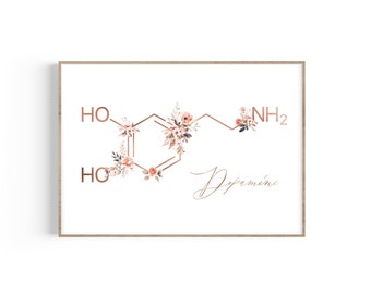 May include: A floral illustration of the chemical structure of dopamine. The molecule is depicted with a copper-colored outline and pink and white flowers. The text "Dopamine" is written in cursive below the molecule.